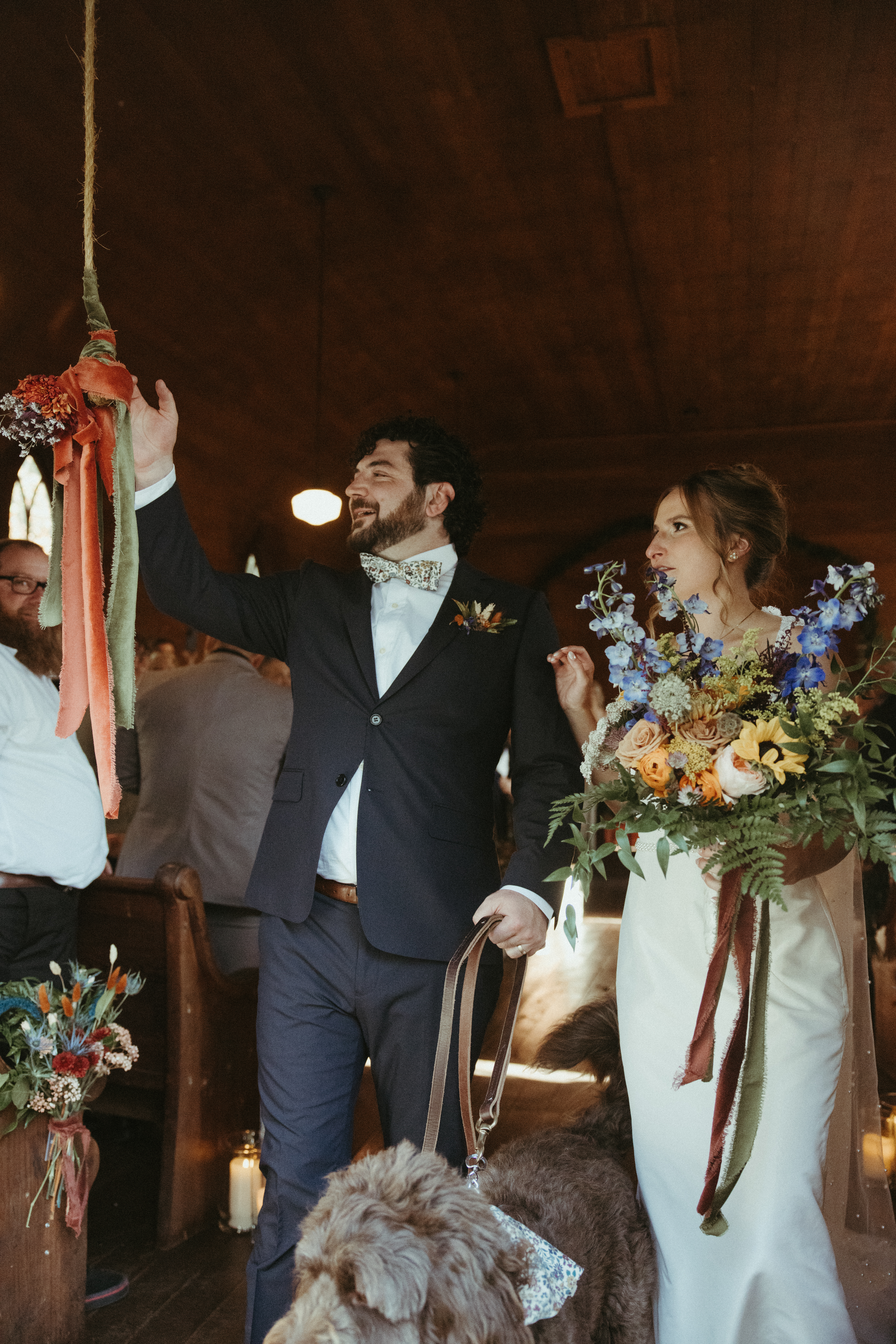 documentary wedding photos in NC at orion schoolhouse and chapel, bride and groom walking out of the wedding ceremony
