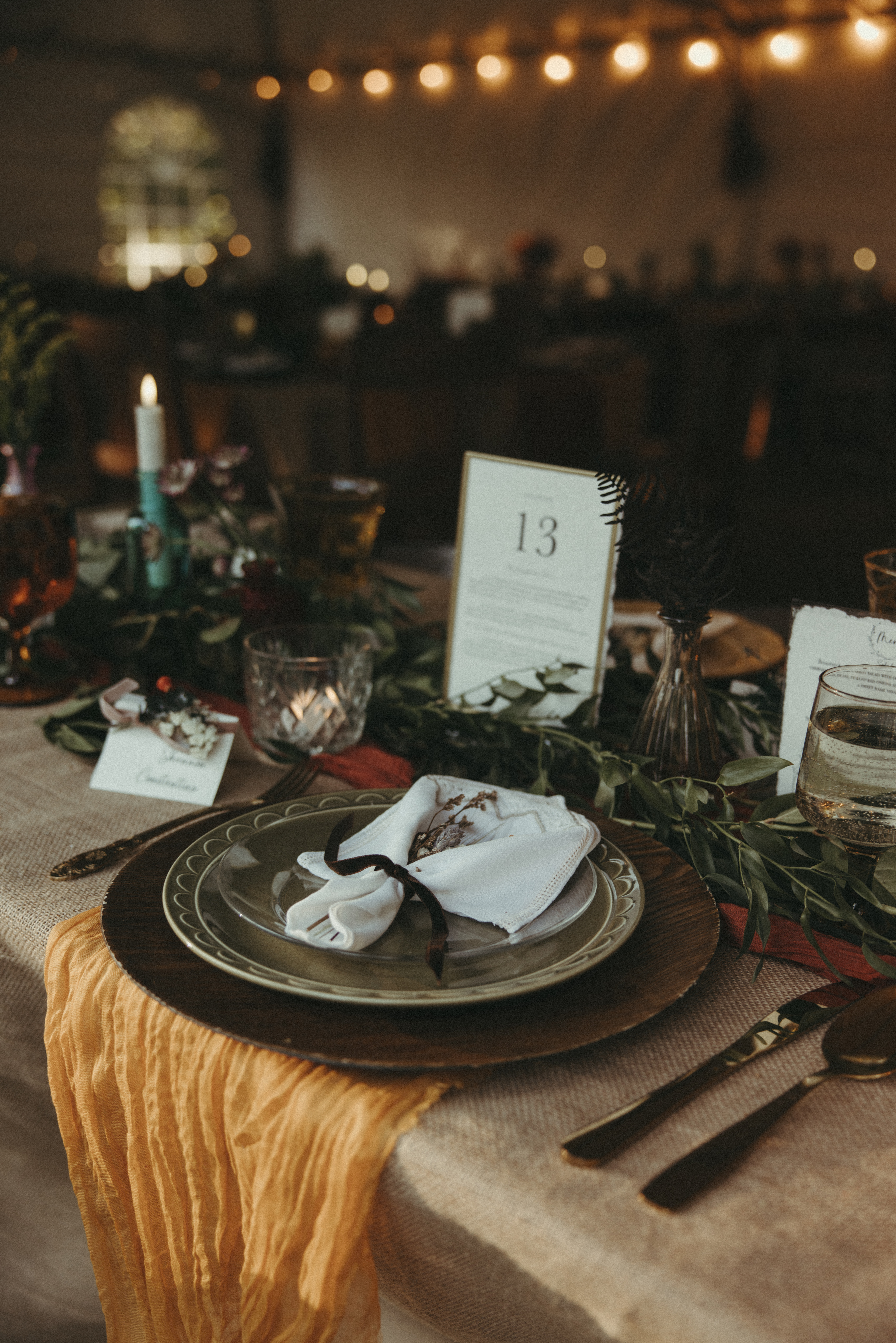 fall outdoor wedding reception decor with personalized table numbers