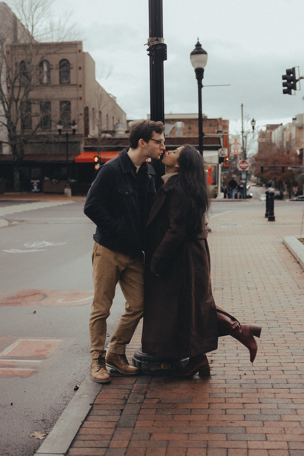 downtown asheville engagement session during winter, fall engagement session outfit inspo