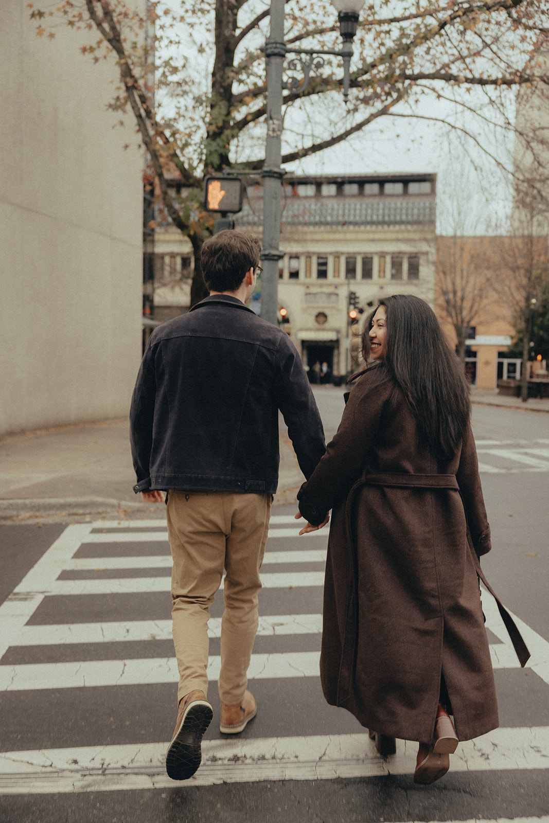 downtown asheville engagement session during winter, fall engagement session outfit inspo